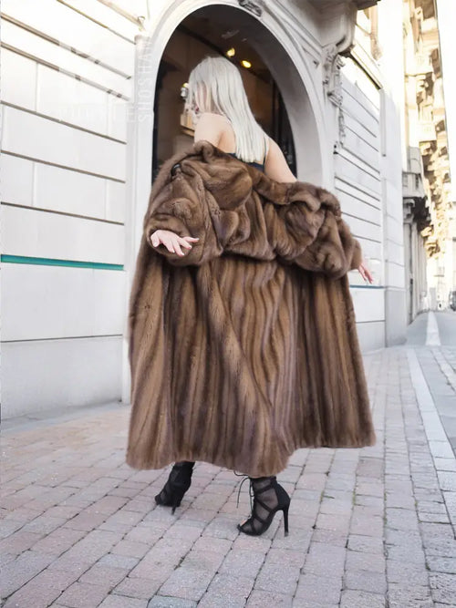 Brown mink fur coat with draped collar and full length silhouette