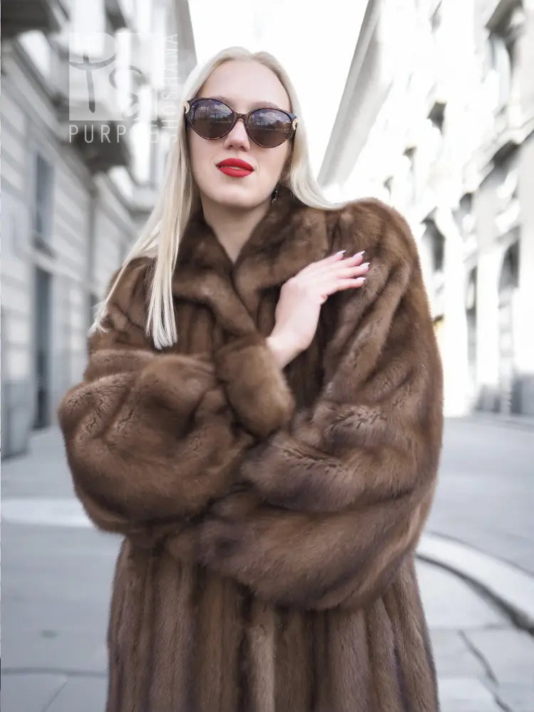 Brown fur mink coat with high collar, button front, and long sleeves