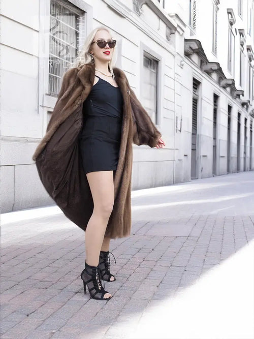 Dark brown mink fur coat with hood, long sleeves, and relaxed swing silhouette