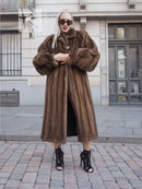 Brown mink fur coat with oversized collar and buttoned front