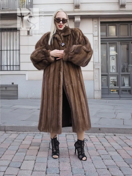 Brown mink fur coat with oversized collar and buttoned front