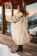 Plush full-length fur coat with notch collar, cream tone, long sleeves (side view)