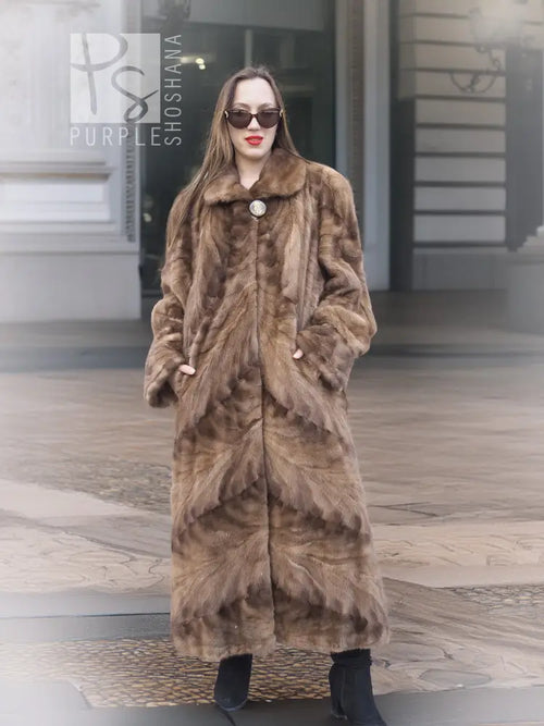 Long mink section coat in brown with button front and wide fur collar