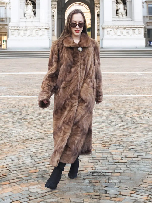 Long mink section coat with button front and standing collar, full swing silhouette