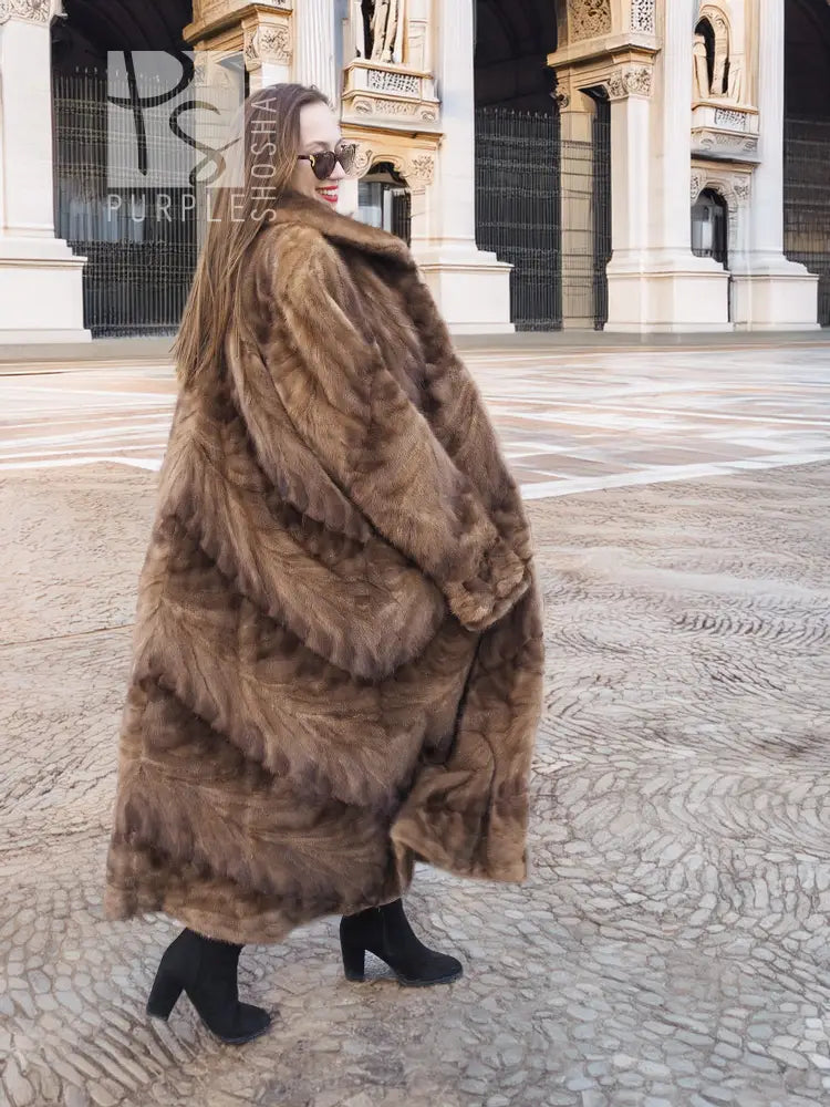 Long mink fur coat with full swing back, button front, in espresso brown.
