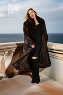 Espresso-toned beaver fur coat with fox collar, open front over a dark dress