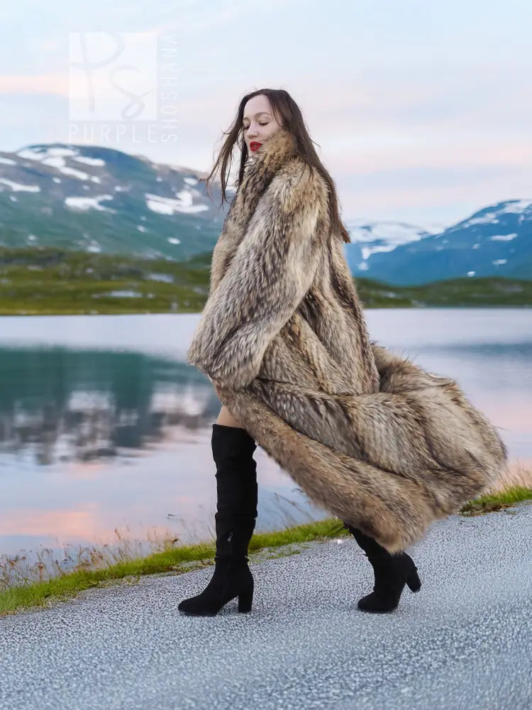 Raccoon fur coat with shawl collar, side pose, open front with long flowing fur.