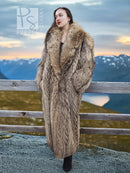 Long raccoon fur coat with shawl collar, standing front view, tan fur with dense texture.