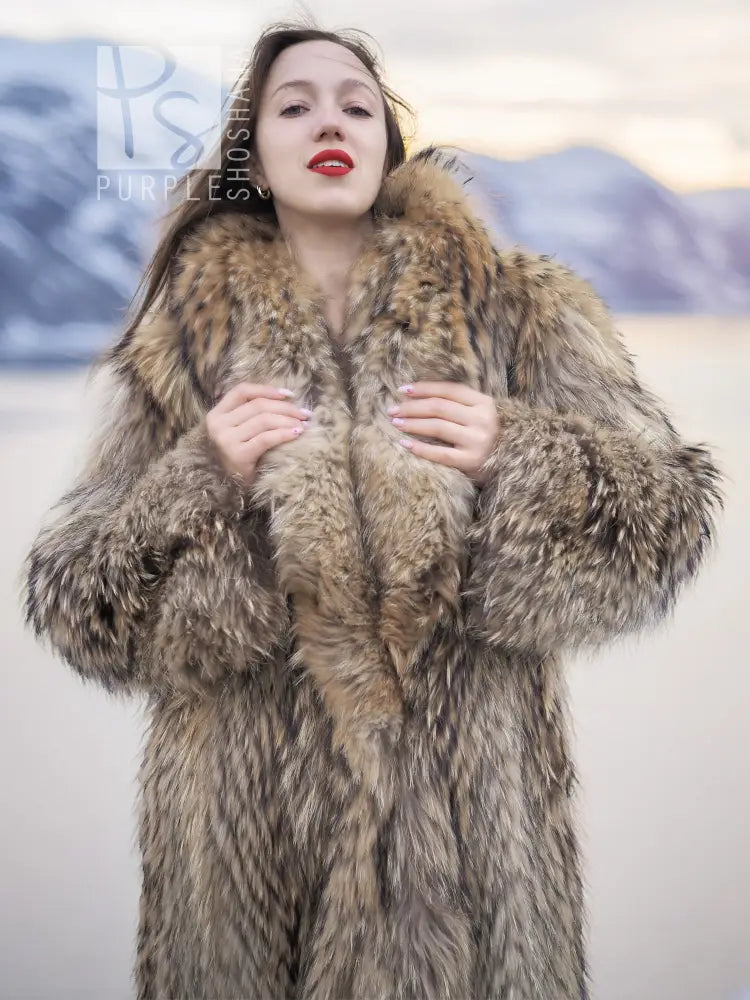 Tan raccoon fur coat with shawl collar, close-up of neckline and shoulders, open front.