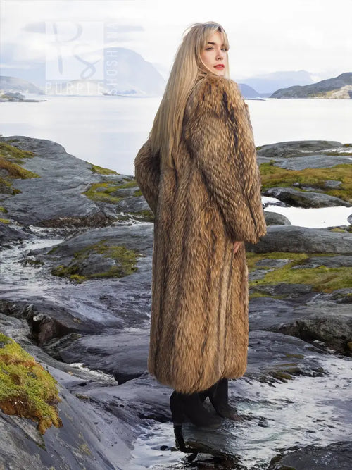 Full-length hooded raccoon fur coat in medium tan and brown with long sleeves