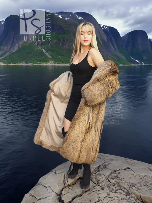 Hooded raccoon fur coat in light brown with thick fur collar and long open front