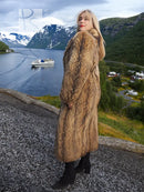 Long hooded raccoon fur coat in tan-brown with open front and full-length hem