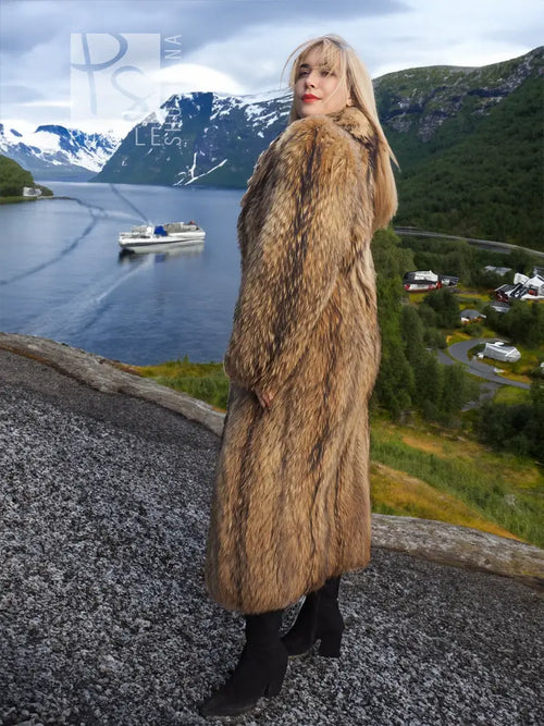Long hooded raccoon fur coat in tan-brown with open front and full-length hem