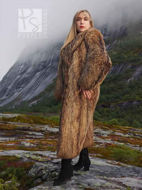 Long brown raccoon fur coat with fur shawl collar and full sleeves