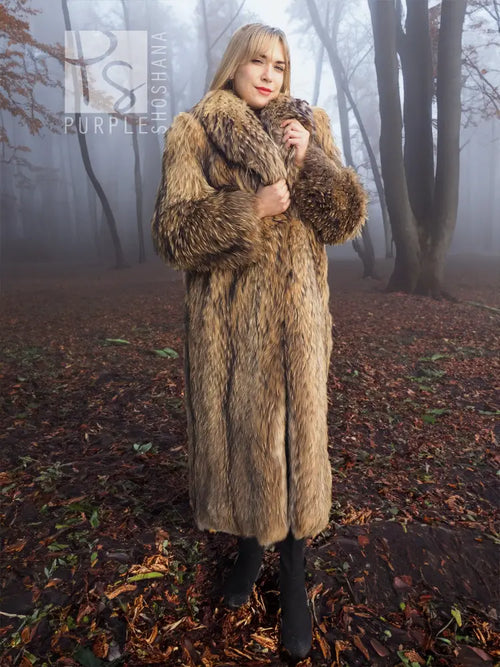 Long brown raccoon fur coat with oversized hood and full-length sleeves