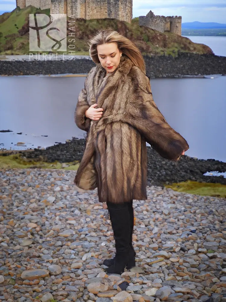 Sable fur coat with buttoned front and thick shaggy fur, dark brown