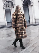 Vintage fur coat with brown and tan mottled stripes, long sleeves and button closure