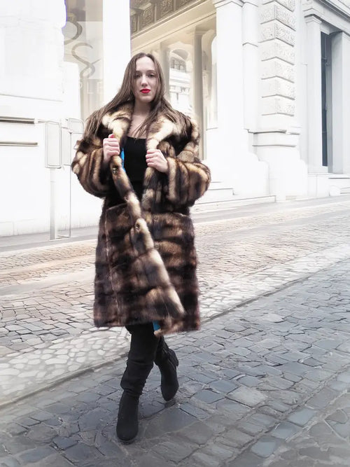 Vintage fur coat with hood and striped fur panels, front opening and long sleeves