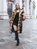 Women’s faux fur coat with dark brown and cream horizontal stripe pattern and buttons