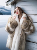 Short fur coat with cream white center panels and tan brown outer sleeves