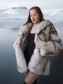 Light gray fox fur jacket with sculpted collar, open front, drape over black slip dress.