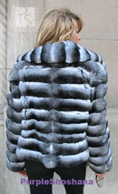 Back view of dark gray hooded fur jacket with wide horizontal stripes