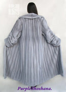 Women's silver-gray mink fur coat, back view with raised collar