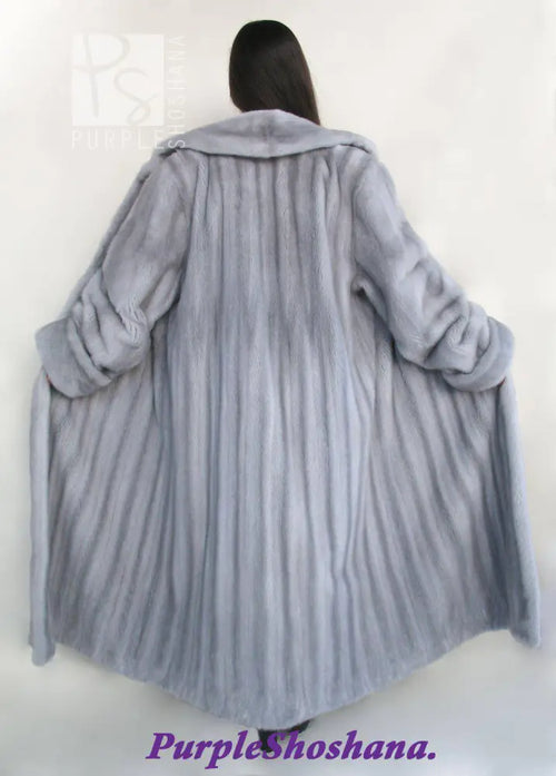 Women's silver-gray mink fur coat, back view with raised collar