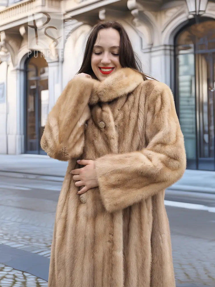 Beige mink fur coat with pointed collar and button-front, long sleeves.