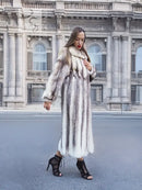 Long cross mink fur coat with open front and wide collar, light gray pattern
