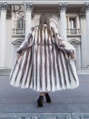 Back view of a hooded mink fur coat with flared skirt and long sleeves