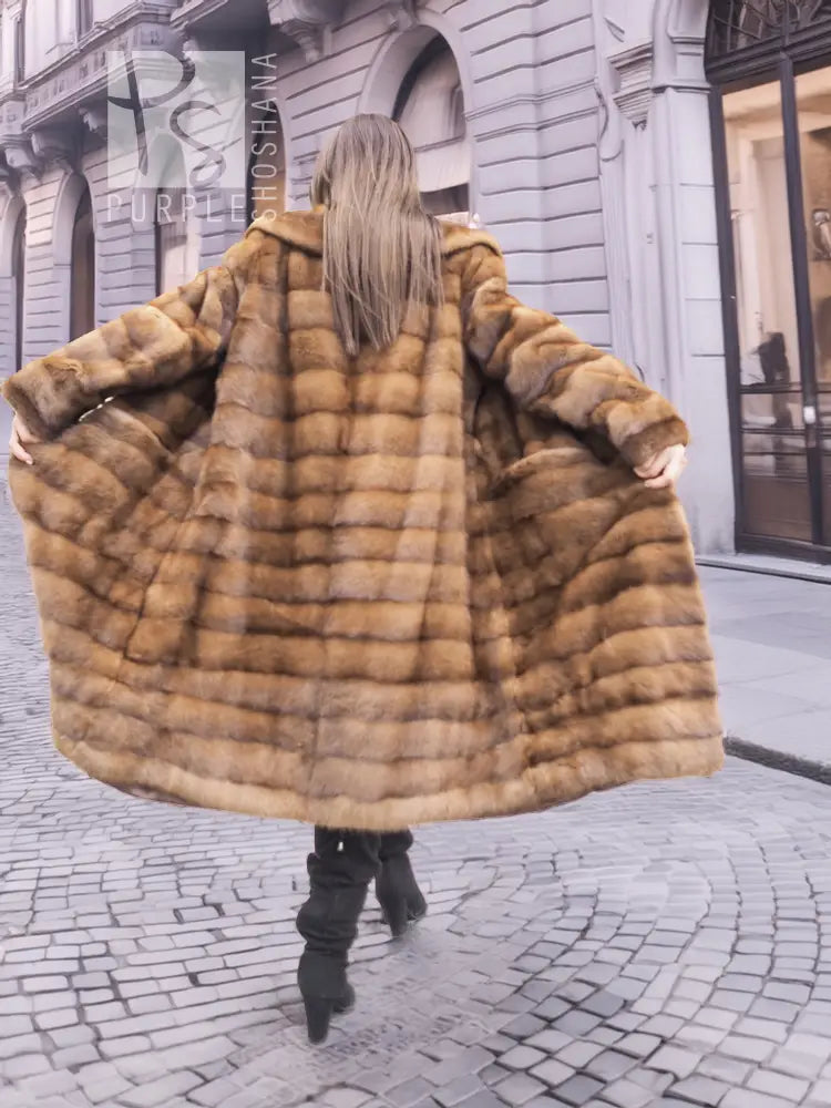 Back view: Beige pastel mink coat with shawl collar, horizontal stripes, long sleeves