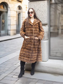 Beige pastel mink coat with shawl collar, horizontal stripes, long sleeves, mid-calf length