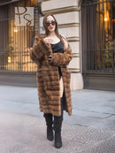 Beige pastel mink coat with shawl collar, horizontal stripes, relaxed fit, long sleeves