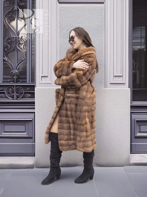 Beige mink fur coat with shawl collar, horizontal panels, front 3/4 view