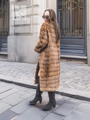 Beige pastel mink coat with shawl collar, horizontal stripes, long sleeves, full length