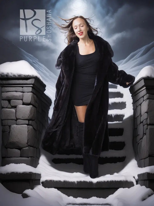 Black hooded long mink coat with silk lining; front view with draped lapels.