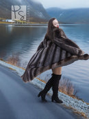 Long raccoon fur coat with broad fur sleeves, dark gray finish and open front detail
