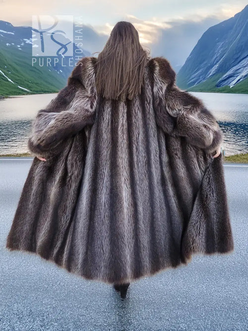 Long raccoon fur coat with hood, dark gray-brown, full sleeves and flared hem