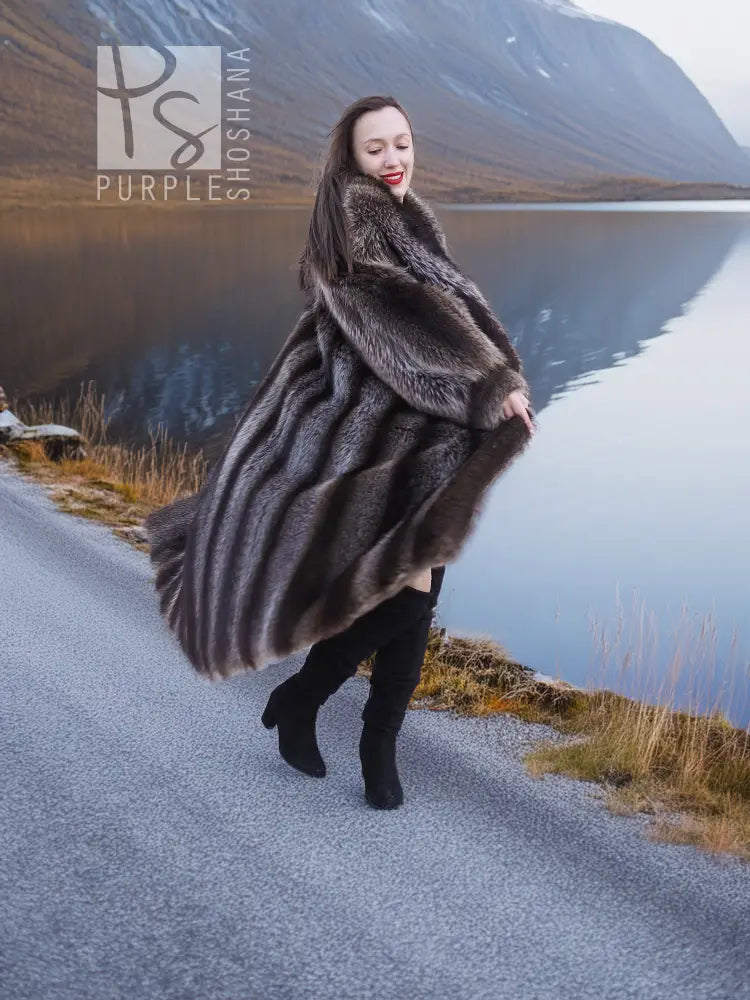 Raccoon fur coat in dark gray-brown with hood, swing hem and thick collar detail