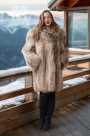 Front view of golden honey raccoon fur coat with full lapels and mid-length cut