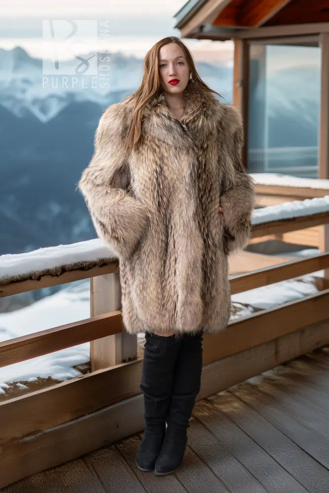Front view of golden honey raccoon fur coat with full lapels and mid-length cut