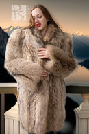 Close-up of golden honey raccoon fur coat with thick lapel and plush shoulder texture