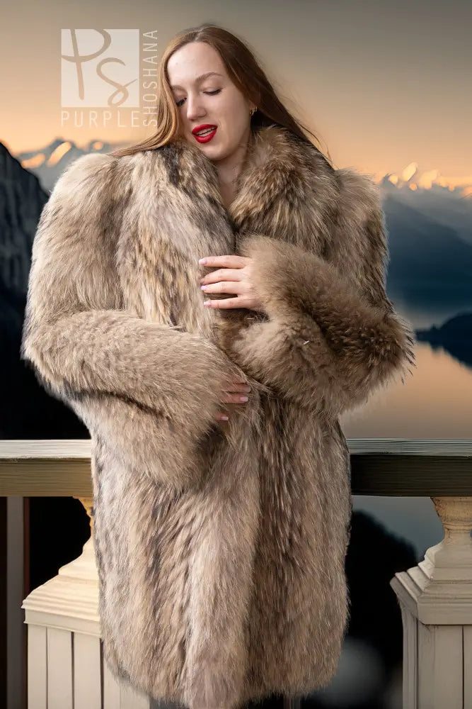 Close-up of golden honey raccoon fur coat with thick lapel and plush shoulder texture
