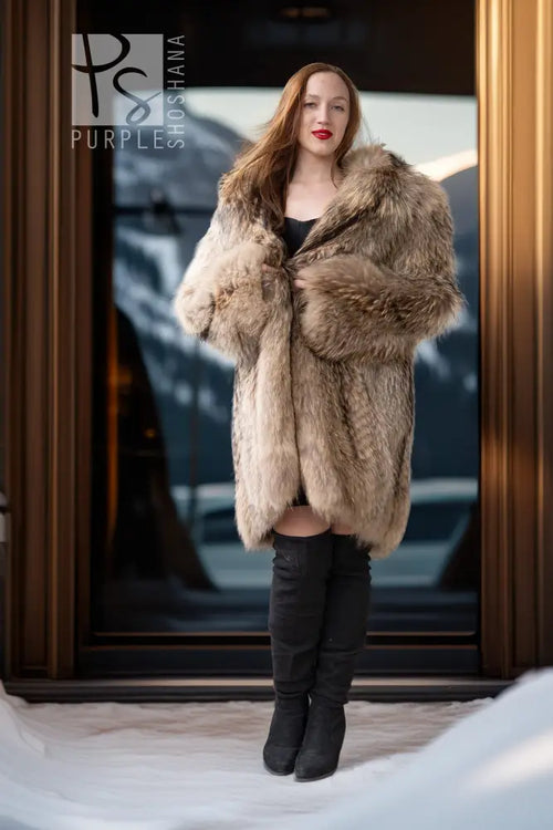 Raccoon fur coat in golden honey tones, front open with structured lapels