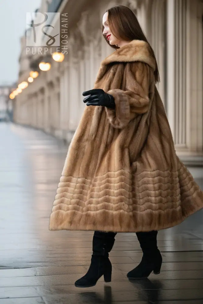 Tan mink coat with plush hood, full length, long sleeves, textured hem panel