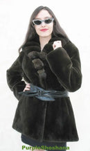 Women's dark fur coat with chinchilla hood trim and wide belt