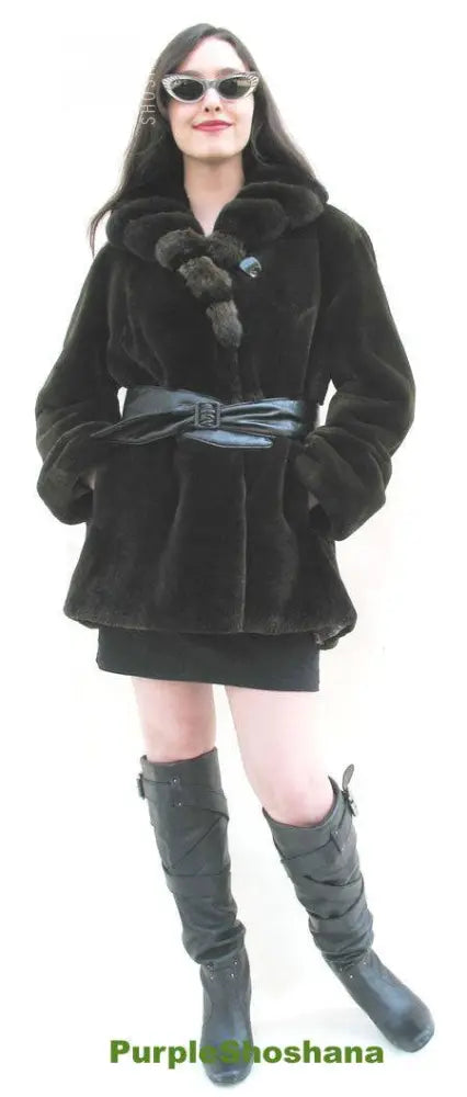 Women's dark fur coat with chinchilla collar and belted waist, front view