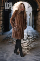 Brown mink stroller coat with thick fur texture, shawl collar, and long sleeves