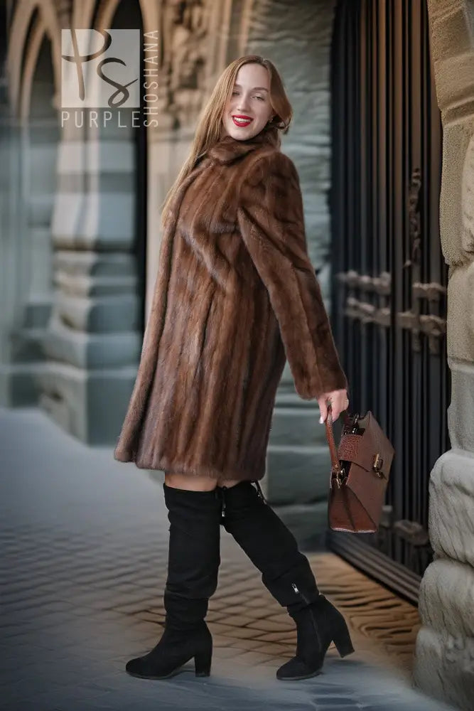 Brown mink stroller coat with structured fit, shawl collar, and long sleeves